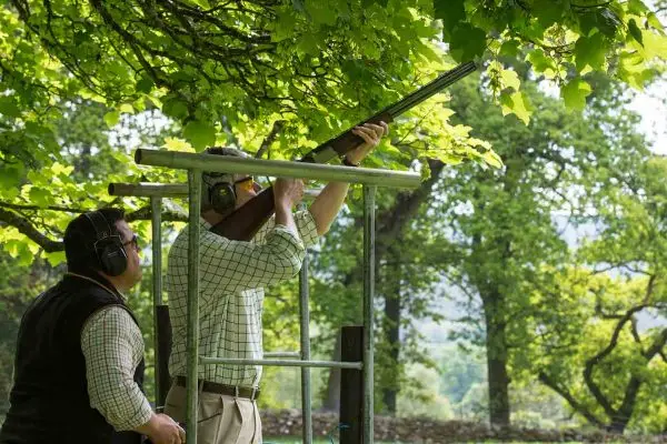 A colour photo of a guest enjoying clay pigeon shooting at the Edradynate clay pigeon shoot day May 2017 - Edradynate Estate, Perthshire - Luxury Country House and Sporting Estate for Rent in Scotland